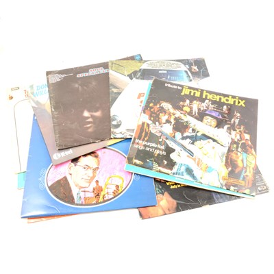 Lot 321 - Two boxes of vinyl records and singles.