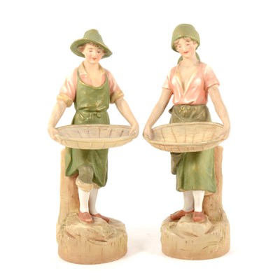 Lot 57 - A pair of Royal Dux figures, modelled as gleaners, ...