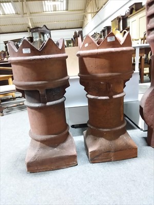 Lot 509 - A pair of terracotta chimney pots, coronet...