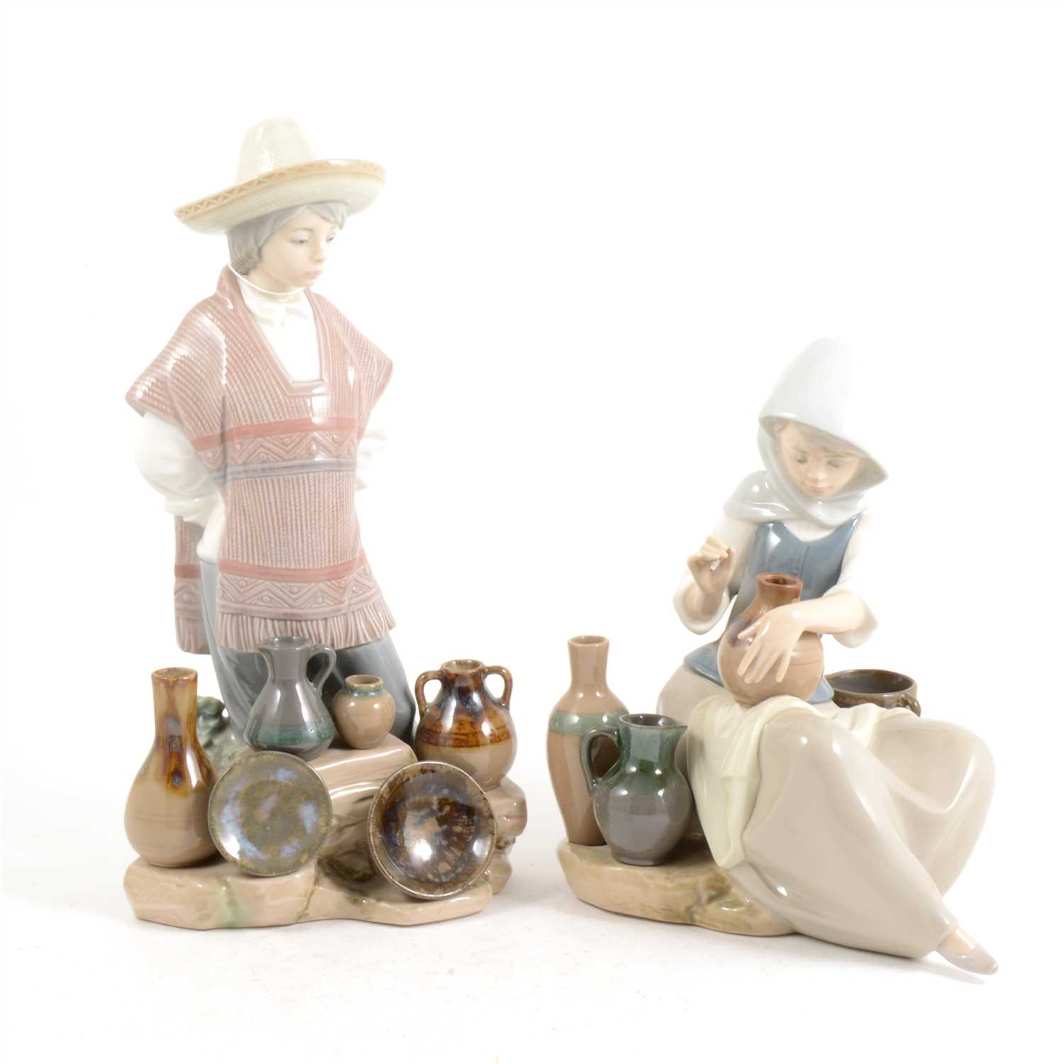 Lot 12 - Two Lladro figures, ...