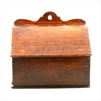 Lot 271 - A Victorian oak candle box, hinged slope front