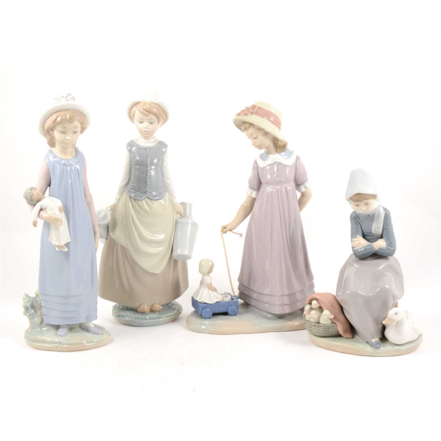 Lot 27 - Four Lladro figures, Girl with a Doll, 59cm, ...