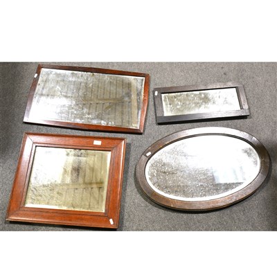 Lot 248 - A rectangular oak framed wall mirror, bevelled plate, 54cm x 45cm and three other mirrors, (4).