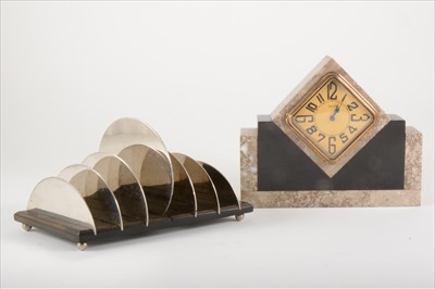 Lot 136 - A small Art Deco marble desk clock and an Art Deco steel toast rack.