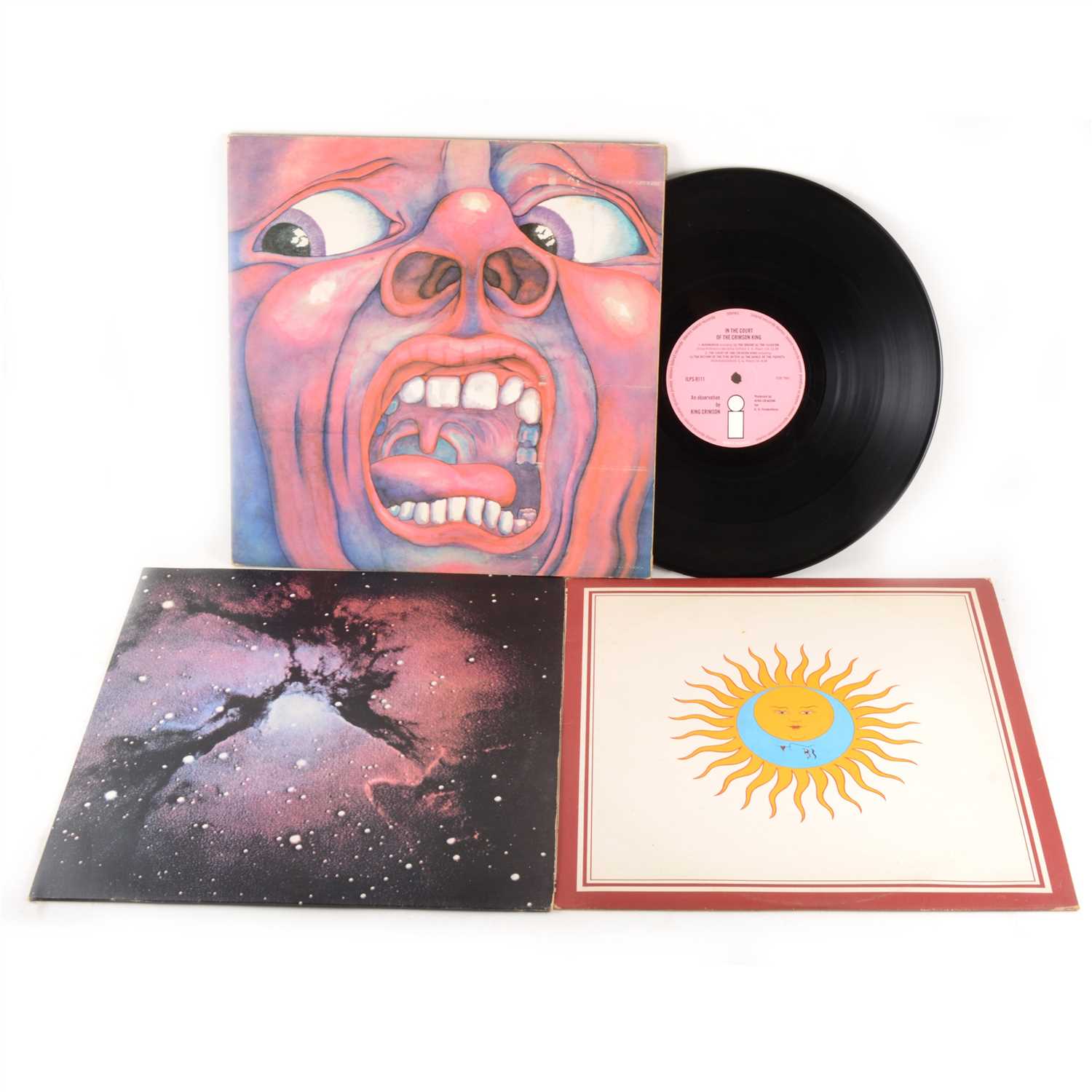 Lot 668 King Crimson; three vinyl LP records, In the