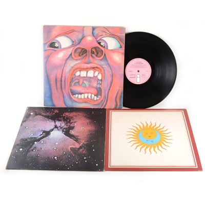 Lot 668 - King Crimson; three vinyl LP records, In the Court of the Crimson King, Larks' Tongues in Aspic and Islands.
