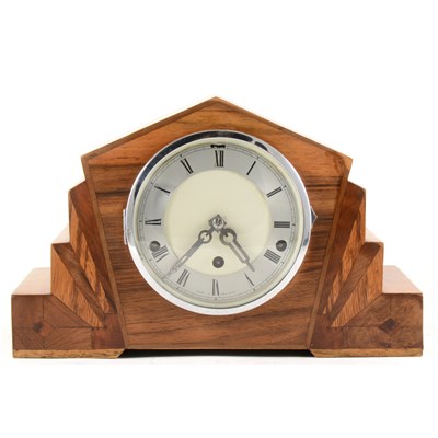 Lot 139 - An Art Deco style mantel clock and a small barometer.