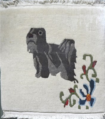 Lot 388 - A wool mat, designed with a dog, ...