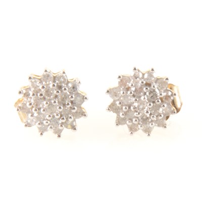 Lot 237 - A pair of circular diamond circular cluster ear-studs.