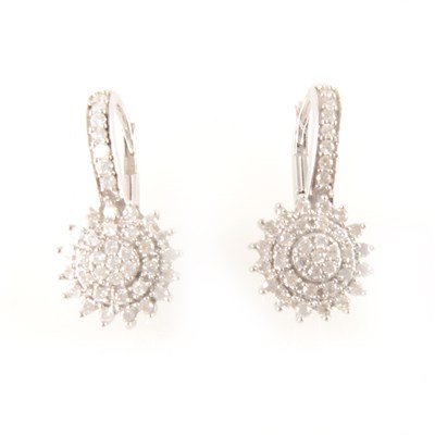 Lot 239 - A pair of diamond cluster earrings.