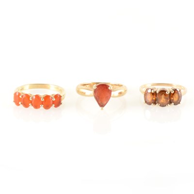 Lot 228 - Three gemstone dress rings, zircon, fire opal and andesine