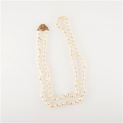 Lot 471 - A cultured pearl rope necklace with 9 carat  gold clasp.