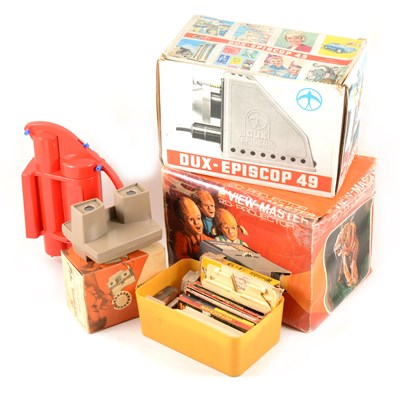 Lot 174 - Vintage toy slide viewers, projectors and Amersham table skittle game.