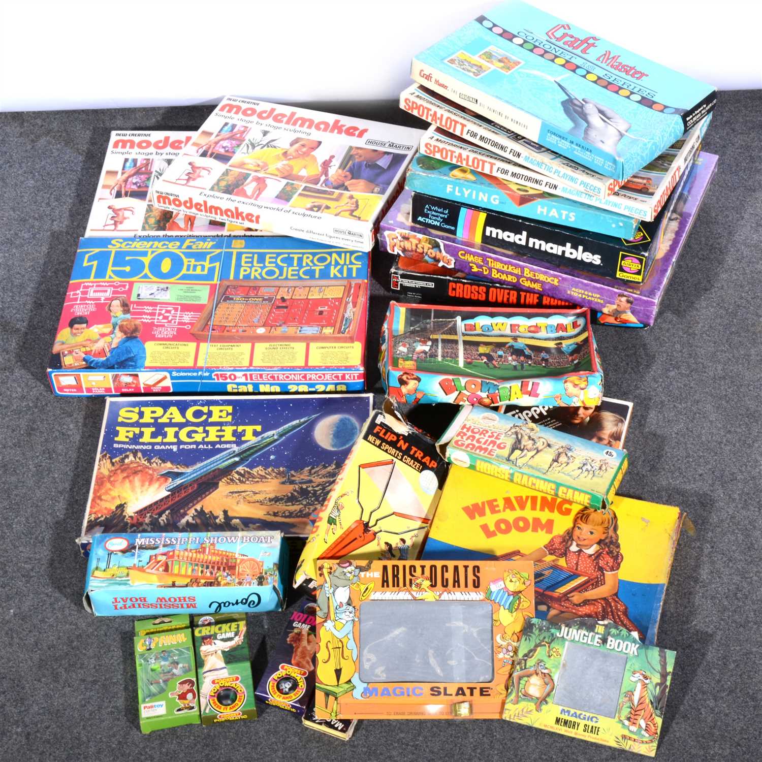 Lot 168 - Vintage board games and toys; approximately twenty including Coral Mississippi Show boat model and others.