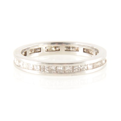 Lot 200 - A diamond full eternity ring.