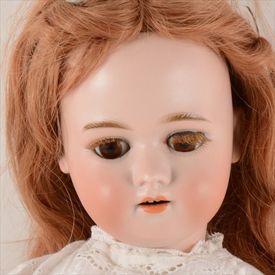 Lot 115 - A German type bisque head a doll, head stamp SP. I, with sleeping eyes, open mouth, composition body, 64cm