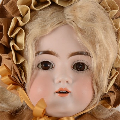 Lot 114 - A German bisque head doll, leather body, sleeping eyes, open mouth, 56cm