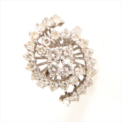 Lot 289 - A diamond crossover cluster ring.