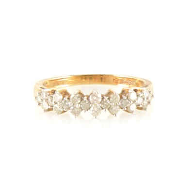 Lot 280 - A diamond half eternity ring.