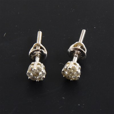 Lot 236 - A pair of circular diamond cluster earrings.