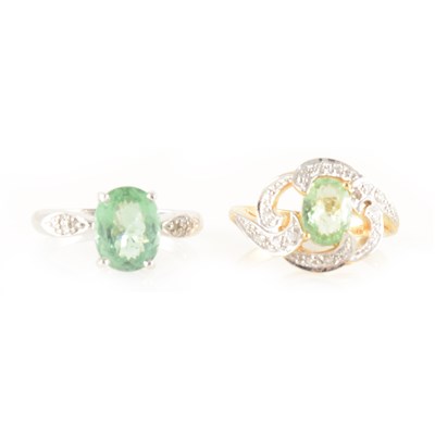 Lot 223 - Two Paraiba tourmaline and diamond dress rings.