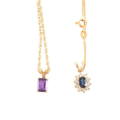 Lot 254 - A sapphire and diamond pendant and chain and an amethyst pendant and chain.