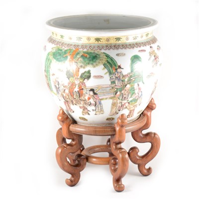 Lot 48 - A large modern Chinese jardinière decorated with landscapes and figures, and a hardwood stand.