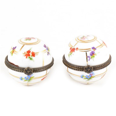 Lot 5 - A pair of Continental porcelain trinket boxes with metal mounts.