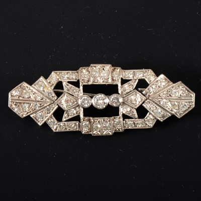 Lot 303 - A rectangular diamond set brooch in the Art Deco style.