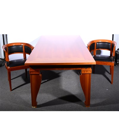 Lot 579 - A contemporary honey stained beechwood dining table, ...