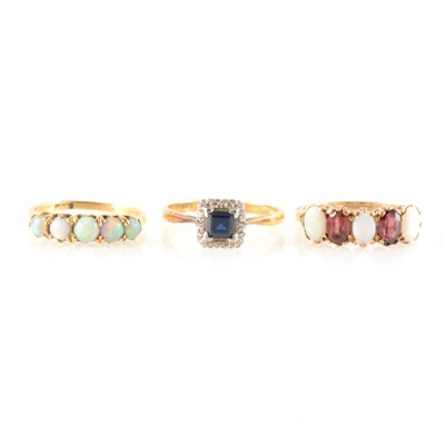 Lot 230 - Three gemset rings.