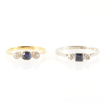 Lot 207 - Two sapphire and diamond three stone rings.