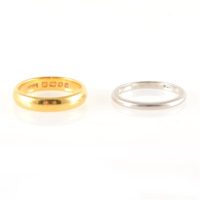 Lot 233 - Two wedding rings,  22 carat yellow gold and platinum.