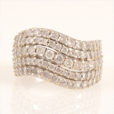 Lot 288 - A diamond five row wave ring.