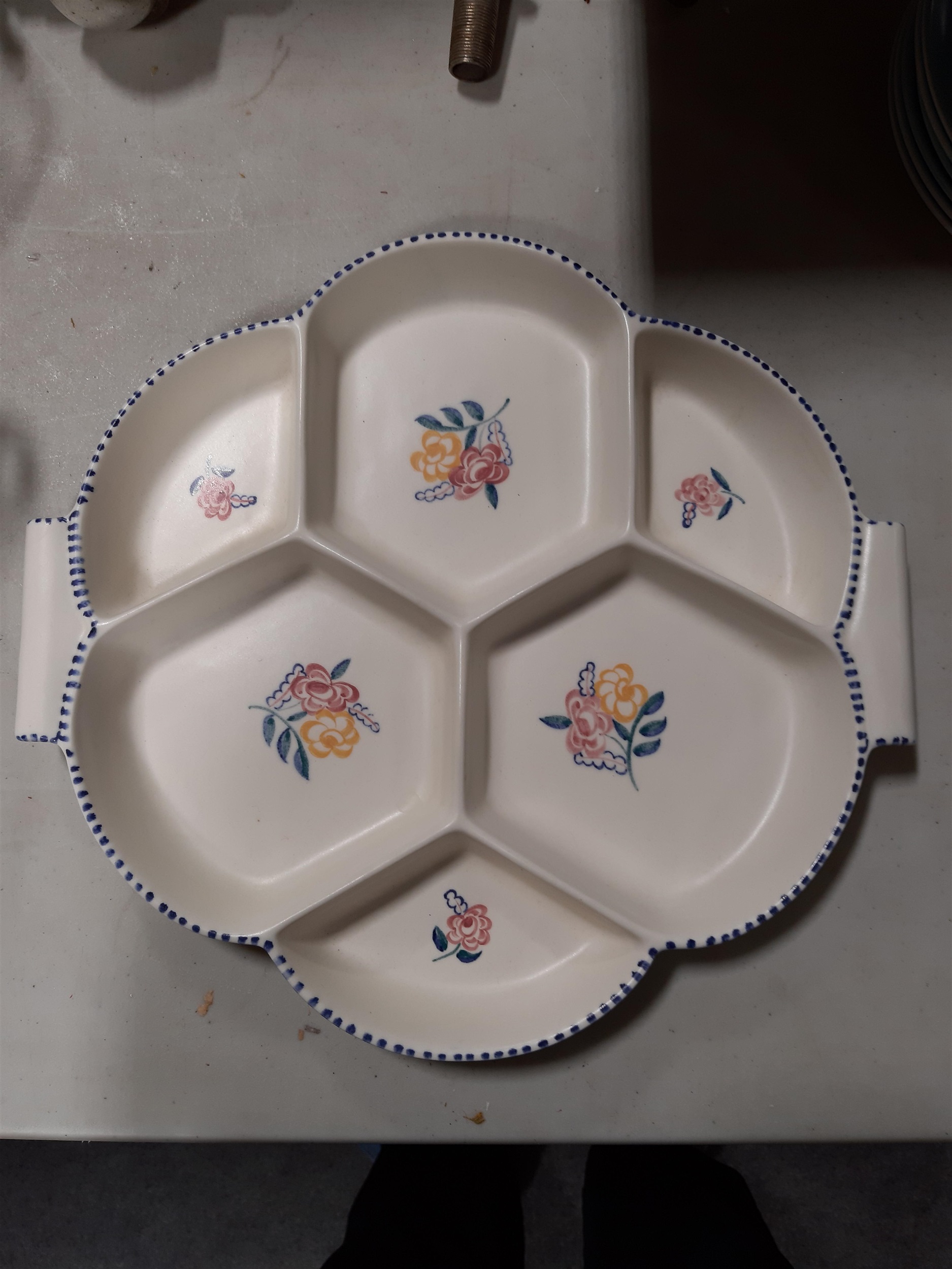 Lot 75 Poole Pottery tea set, hors d'oeuvres dish,