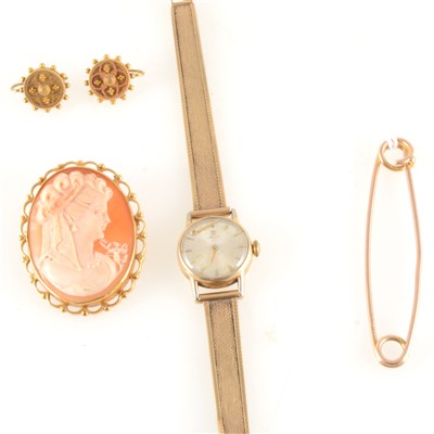 Lot 261A - Omega - a lady's 9 carat yellow gold bracelet watch, cameo brooch, safety pin brooch, etruscan earrings.