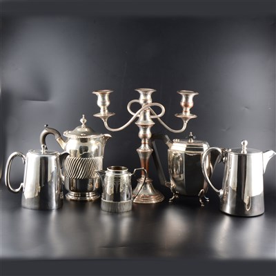 Lot 51 - A quantity of silver-plated, pewter and brass items, including three tankards engraved "Angel Hotel Kettering"