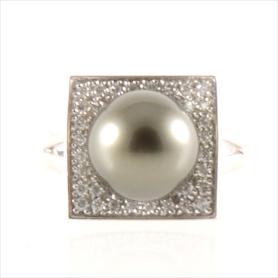 Lot 292A - A Tahitian pearl and diamond ring.