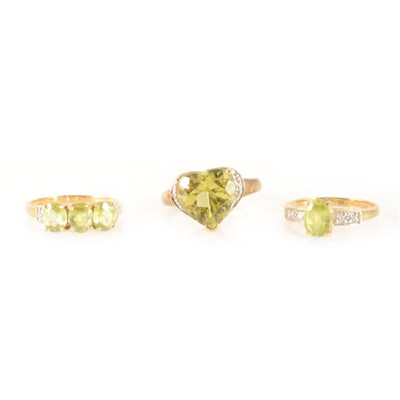 Lot 286 - Three green stone rings.