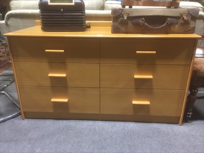 Lot 469 - A modern light oak finish chest of drawers