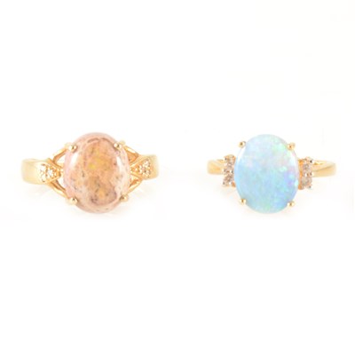 Lot 154 - Two opal rings.