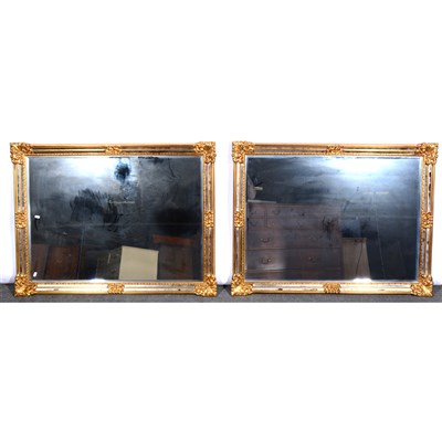 Lot 587 - A pair of contemporary gilt framed wall mirrors, ...