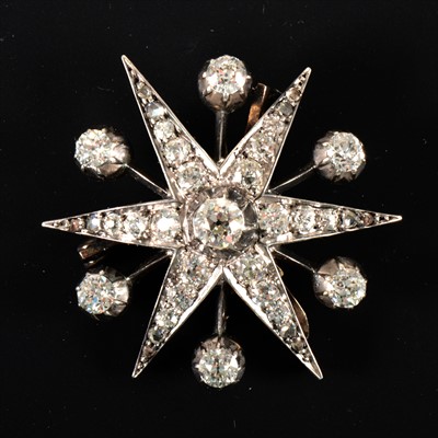 Lot 645 - A Victorian diamond six ray star brooch/pendant