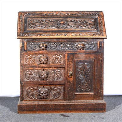 Lot 641 - Victorian carved oak bureau