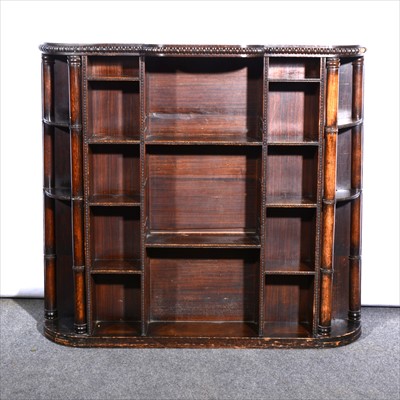 Lot 576 - A rosewood and simulated rosewood open bookcase, ...