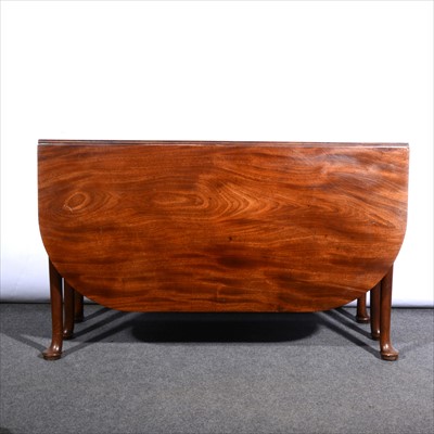 Lot 558 - A George III mahogany dropleaf dining table, ...