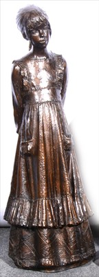 Lot 86 - A bronzed resin figure, of an Edwardian girl, ...