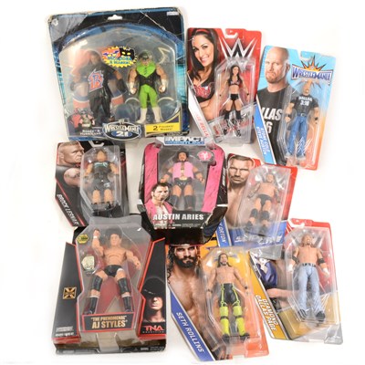 Lot 188 - Eleven WWF and WWE action figures, all in blister packs.