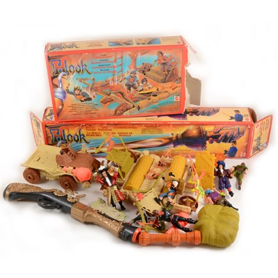 Lot 183 - Hook toys by Mattel; a selection of loose figures, Catapult boxed, gun, and an empty box for a sword.