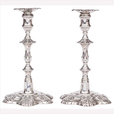 Lot 641 - A pair of George II silver candlesticks